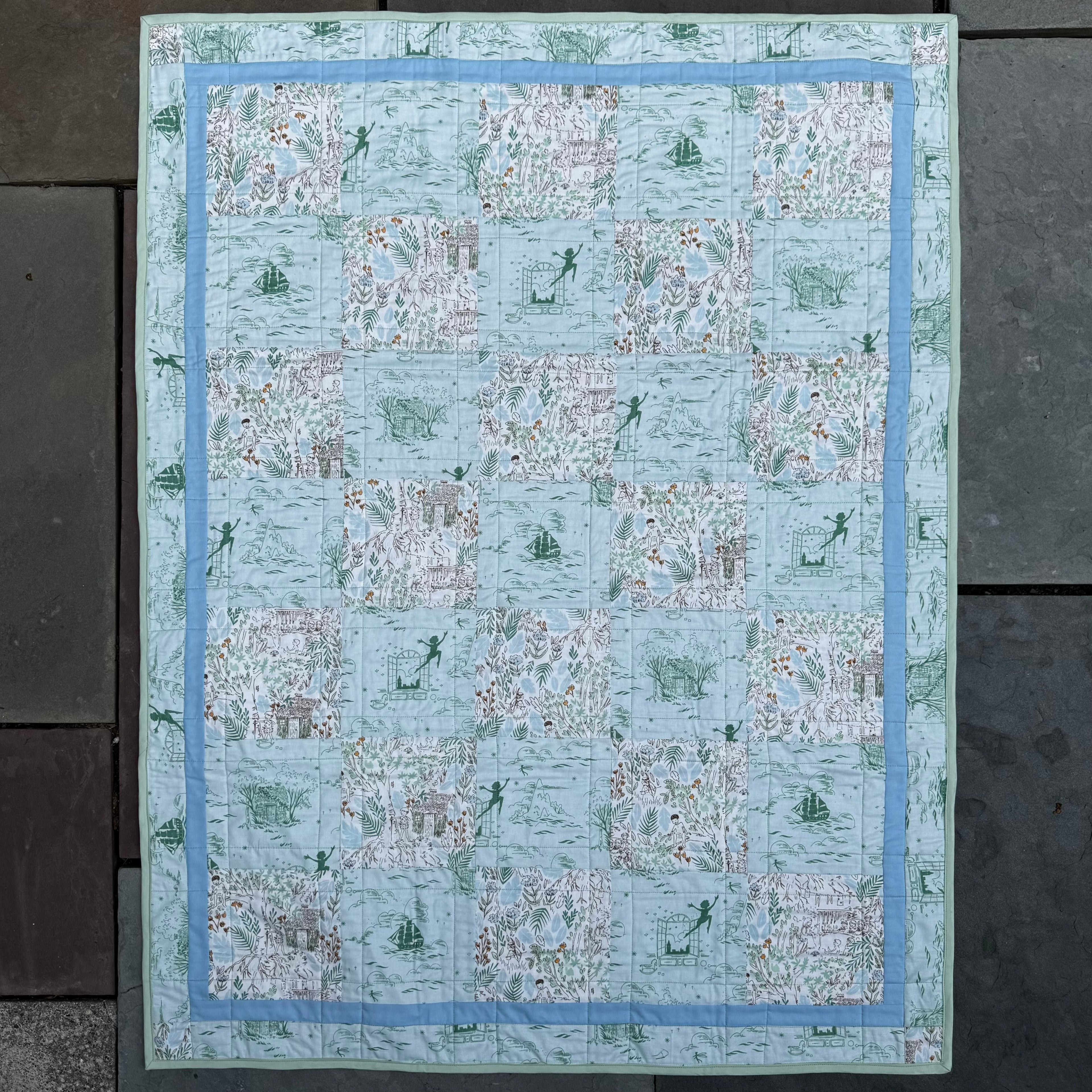 Peter Pan “Adventurine” Crib Quilt